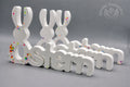 Dekorationsaufsteller „Ostern“ mit Hasenmotiv aus Keraflott – handgefertigter Schriftzug mit Figur